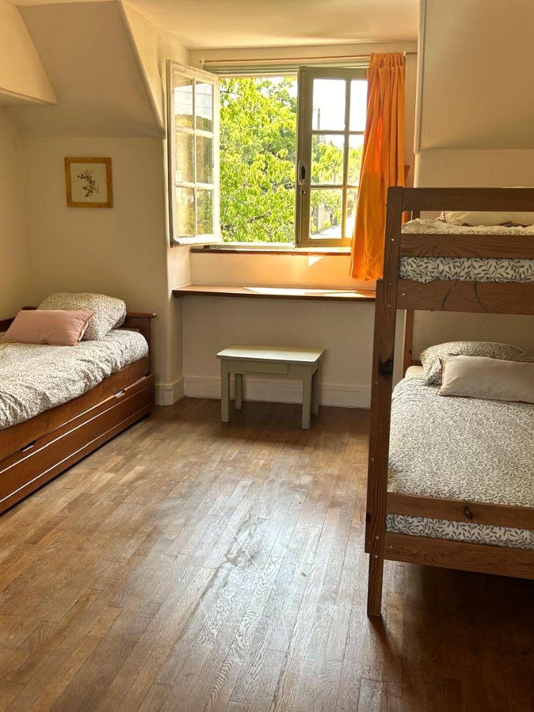 Lits superposés et lit gigogne sous les combles